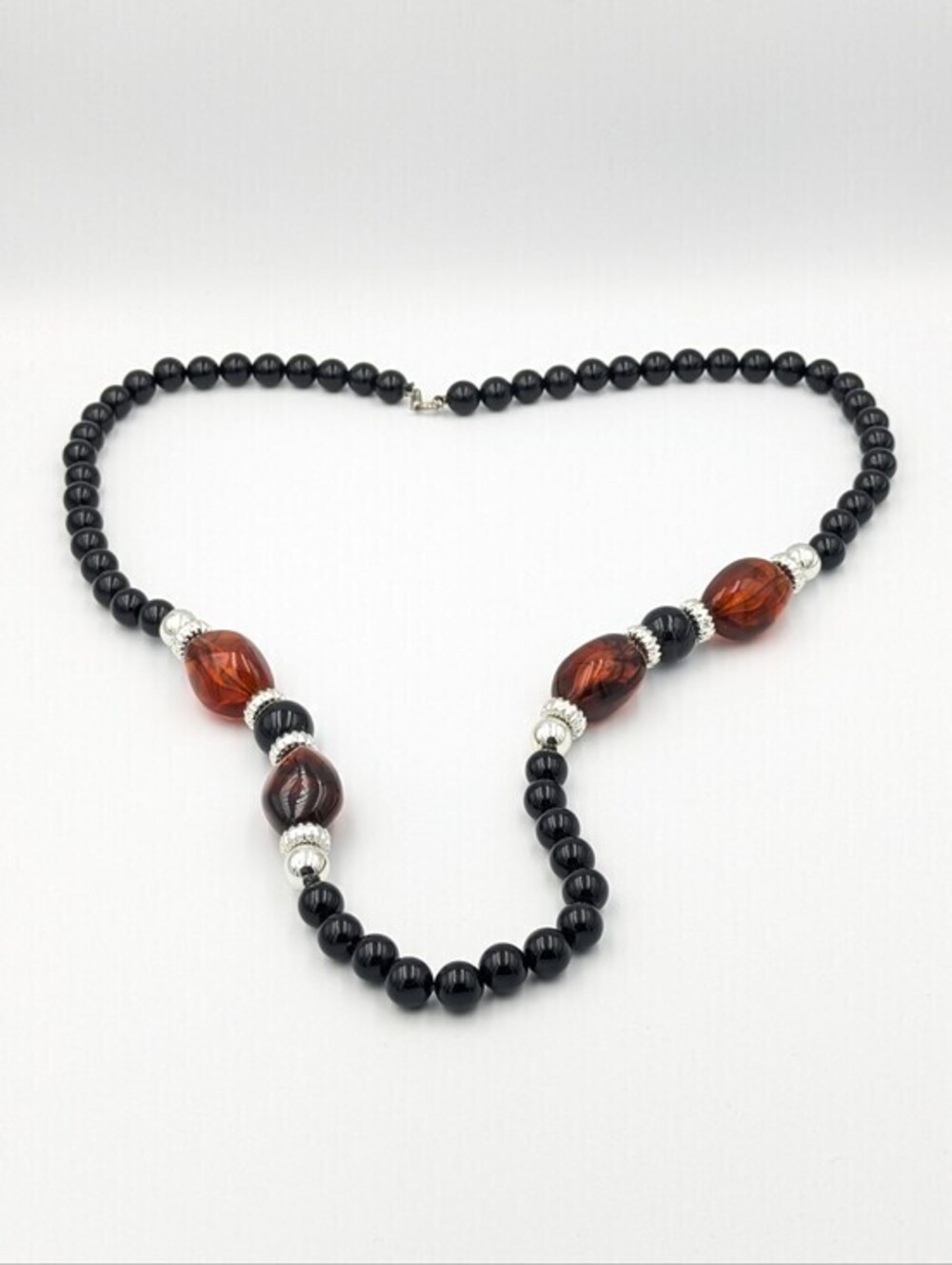 Vintage black and faux amber coloured plastic beaded necklace